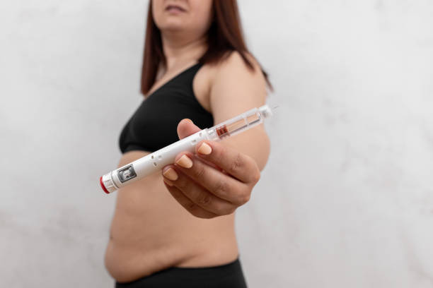 obese fat woman injecting semaglutide injection control blood sugar levels